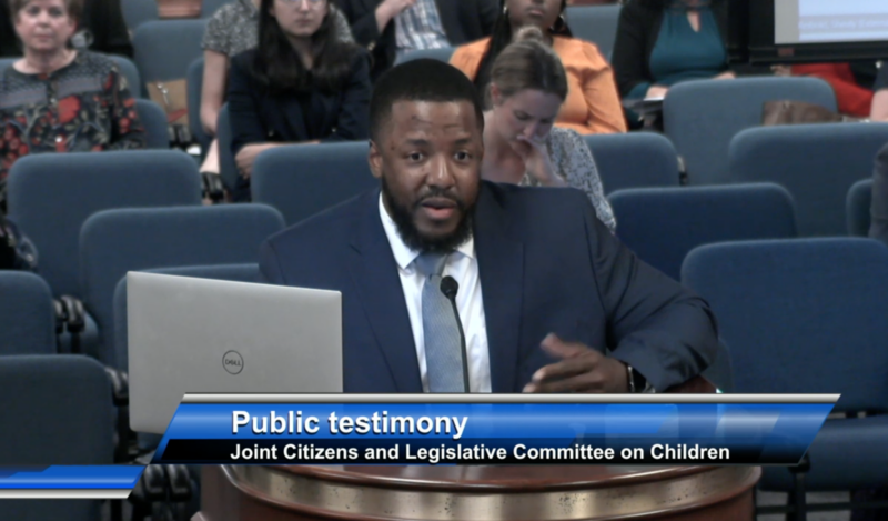 Marc Brown giving a testimony