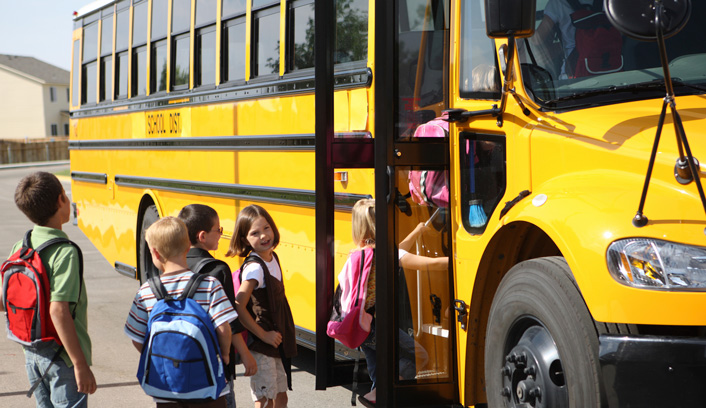 Kids boarding school bus