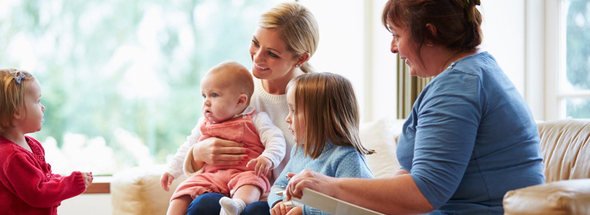 Health-Visitor-Talking-To-Mother-With-Young-Children