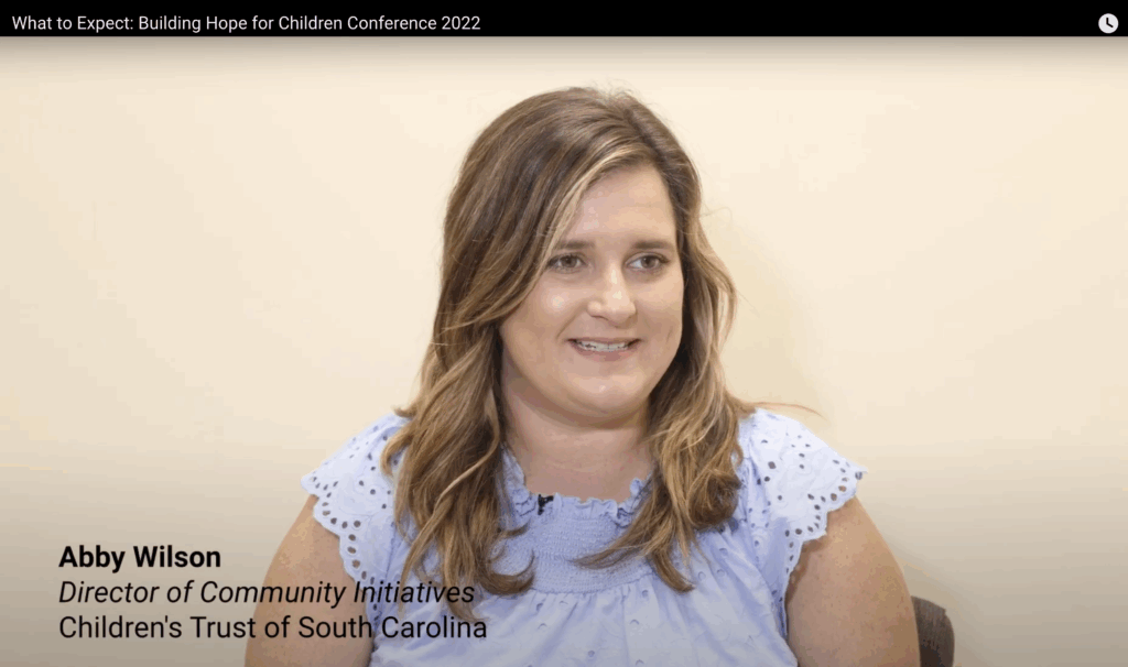 Abby Wilson speaks on camera about the conference