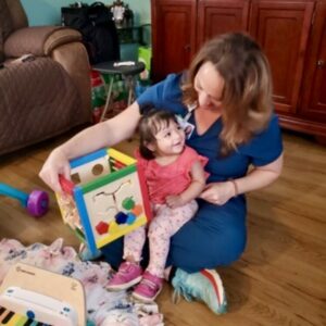 Home visitor and child