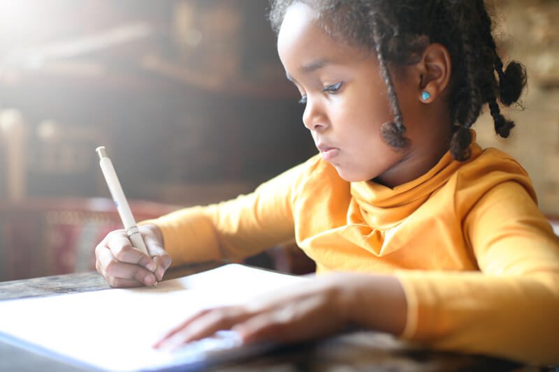 Black-girl-writting-800x0-c-default Black girl writting 800x0 c default