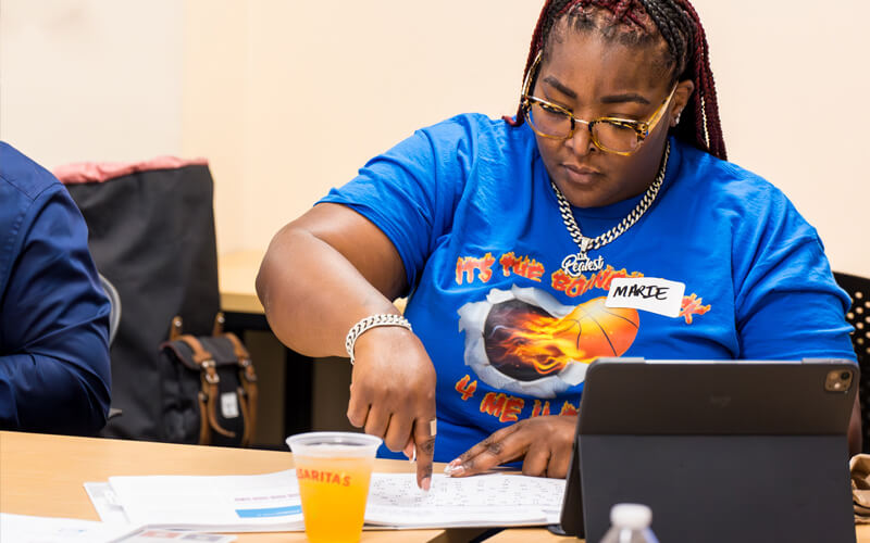 Attendee in a session exercise during the Unlock the Power of Resilience in Your Community: Become a Trainer in Adverse Childhood Experiences (ACEs) and Building Resilience training.