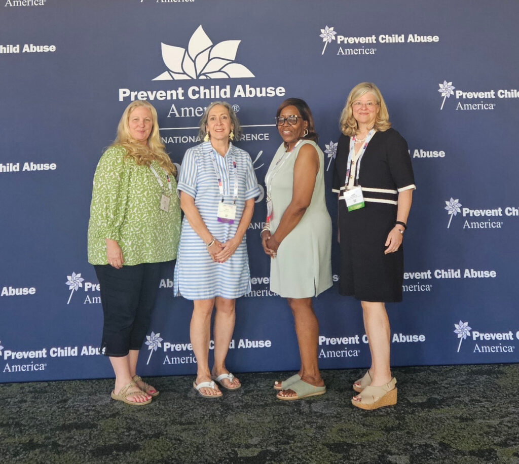 Joan Hoffman, Sue Williams, Stacy Rease and Bett Williams attend the Prevent Child Abuse America Conference.