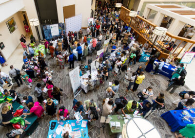 Attendees visit exhibitors at the 2024 Building Hope for Children Conference.