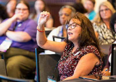 Attendee speaking during a session at the 2024 Building Hope for Children Conference.