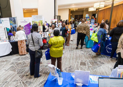 Attendees with exhibitors at the 2024 Building Hope for Children Conference.