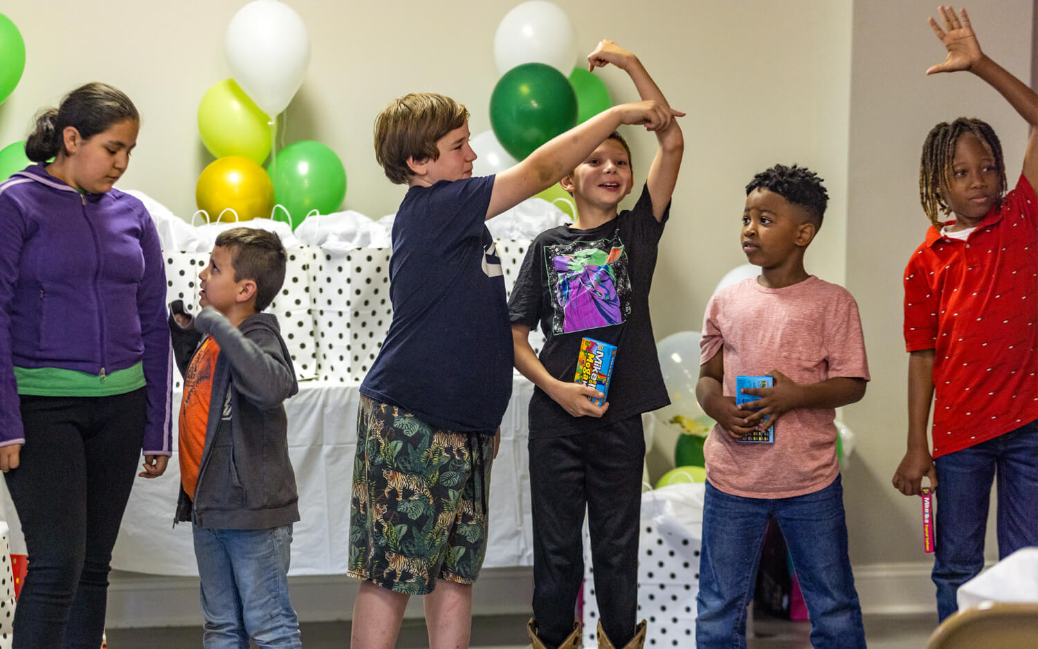 Several kids lined up at the strengthening families program graduation at Westview Behavioral Health in Greenwood, South Carolina.