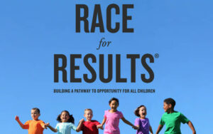 Annie E Casey Foundation, 2024 Race for Results report cover. Kids holding hands in a line below a blue sky.