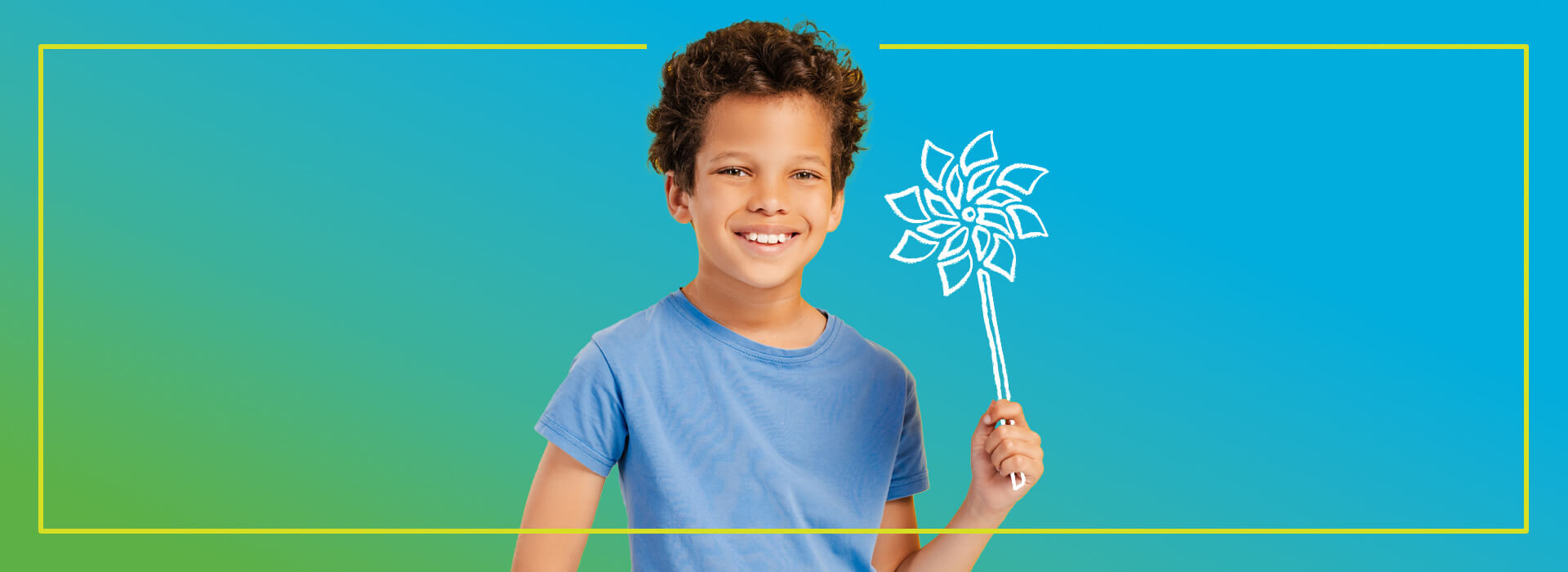 Boy holding pinwheel.