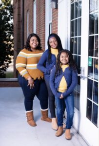 Camille McCrorey and her daughters, Keziah and Nema.