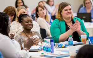 Child Well Being Coalition meeting members applaud