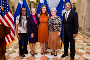 Jhayiah Robinson, a mom who has benefited from home visiting services, Sue Williams, Children’s Trust CEO, Lt. Governor Evette, Senator Katrina Shealy, and Senator Mike Reichenbach