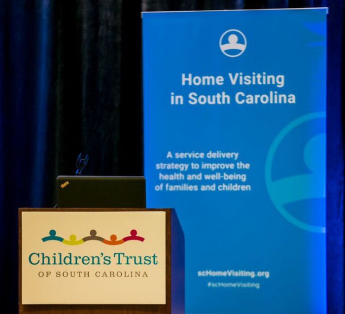Home visiting banner at a recent Children's Trust conference