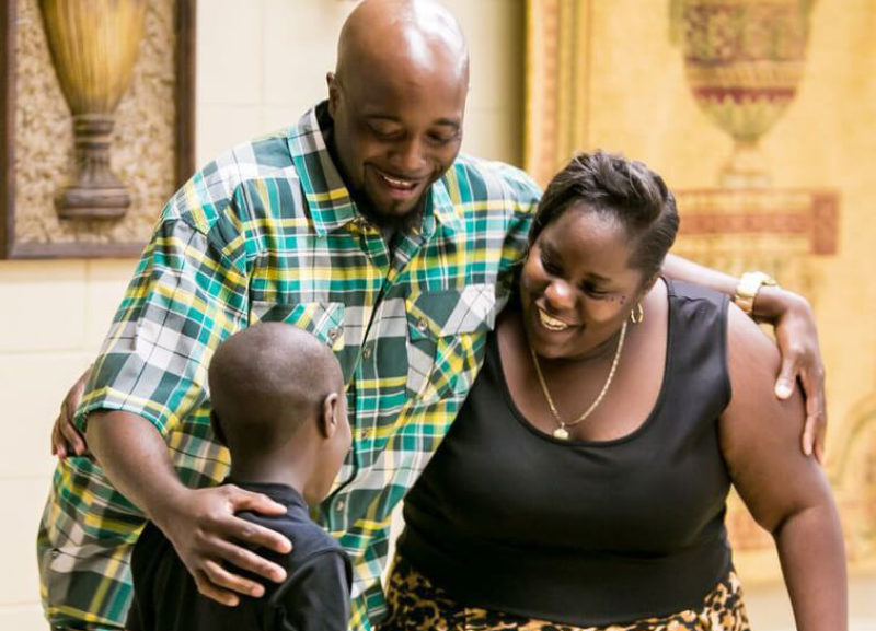 Strengthening Families Program graduation family embracing