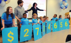 Upstate-Investment-Announcement-Kids-holding-dollar-amount-signs